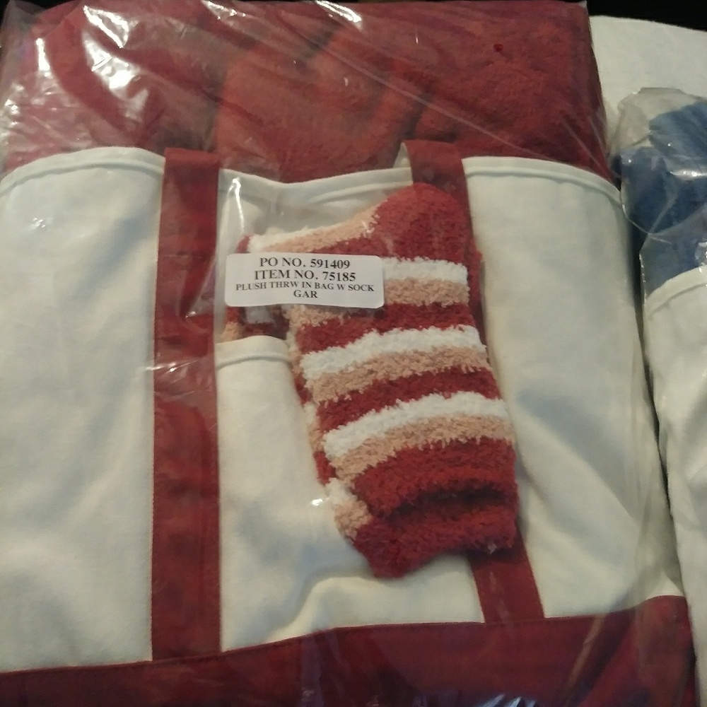 Plush throw with bag nd socks